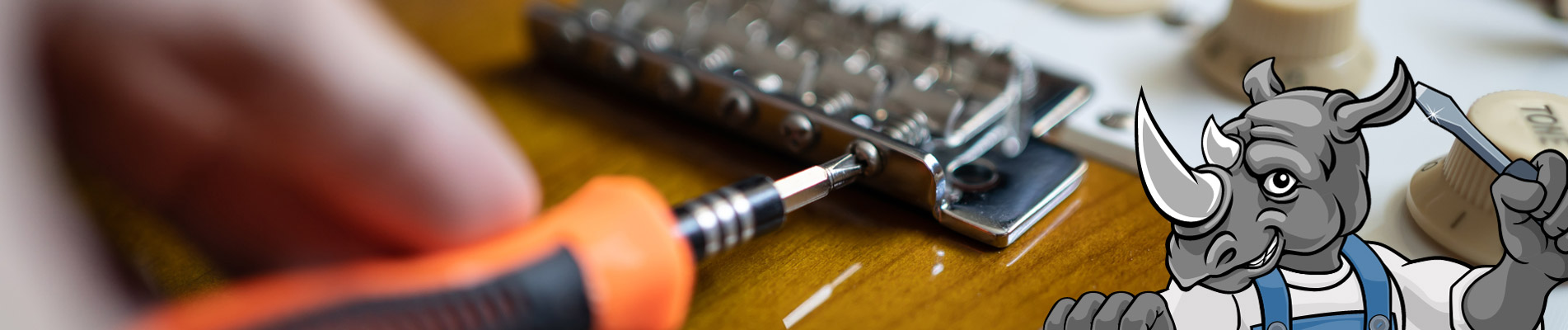 Régler la hauteur des cordes de guitare électrique